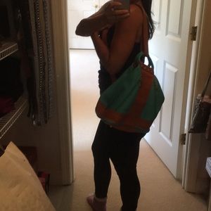 Valentina turquoise leather handbag.